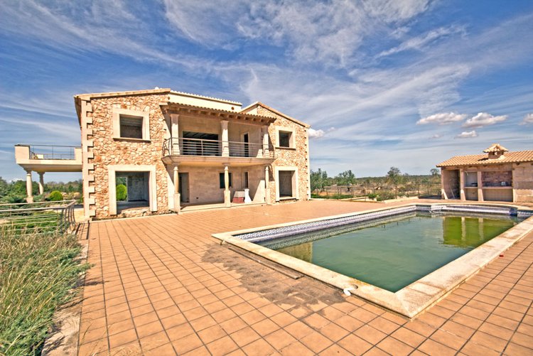 Casa de campo con vistas al mar en venta en Ses Salines